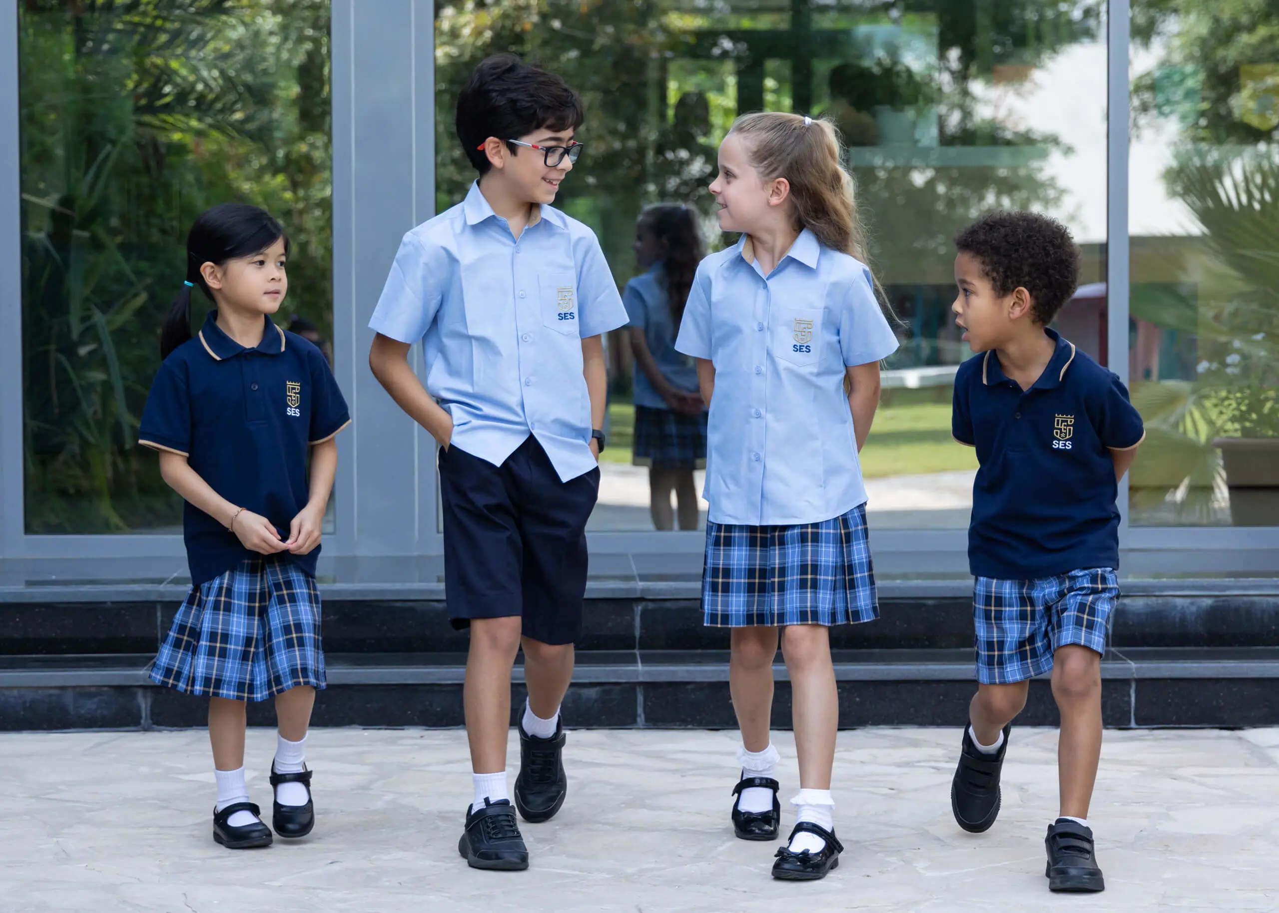 Pupils walking in the school grounds at SES